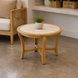 Surya Cape Town 24" round beige stone and aluminum end table with wood-look base.
