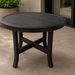 Round black hand-painted aluminum outdoor end table with slatted top and X-base.