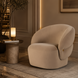 Surya Katarina accent chair in beige polyester with a curved design and natural rubber wood base.