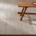 Surya Abby ABB-2301 hand-woven recycled PET yarn area rug in a neutral, low-profile texture.