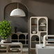 Surya Tana Bookcase: Ivory washed mango wood, tall, global-inspired bohemian design with arched shelves.