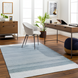 Hand-woven Surya Abby ABB-2302 area rug with blue and white transitional stripes in a home office.