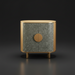 Surya Poros Cabinet with silver gray lacquered cork veneer top, brown natural oak base, and round wood handle.