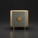 Surya Poros Cabinet with silver gray lacquered cork veneer top, brown natural oak base, and round wood handle.