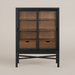 Surya Marin 55" black and brown wood bookcase with glass sliding doors and two drawers.