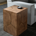 Brown lacquered acacia end table with natural wood grain, next to a gray sofa.