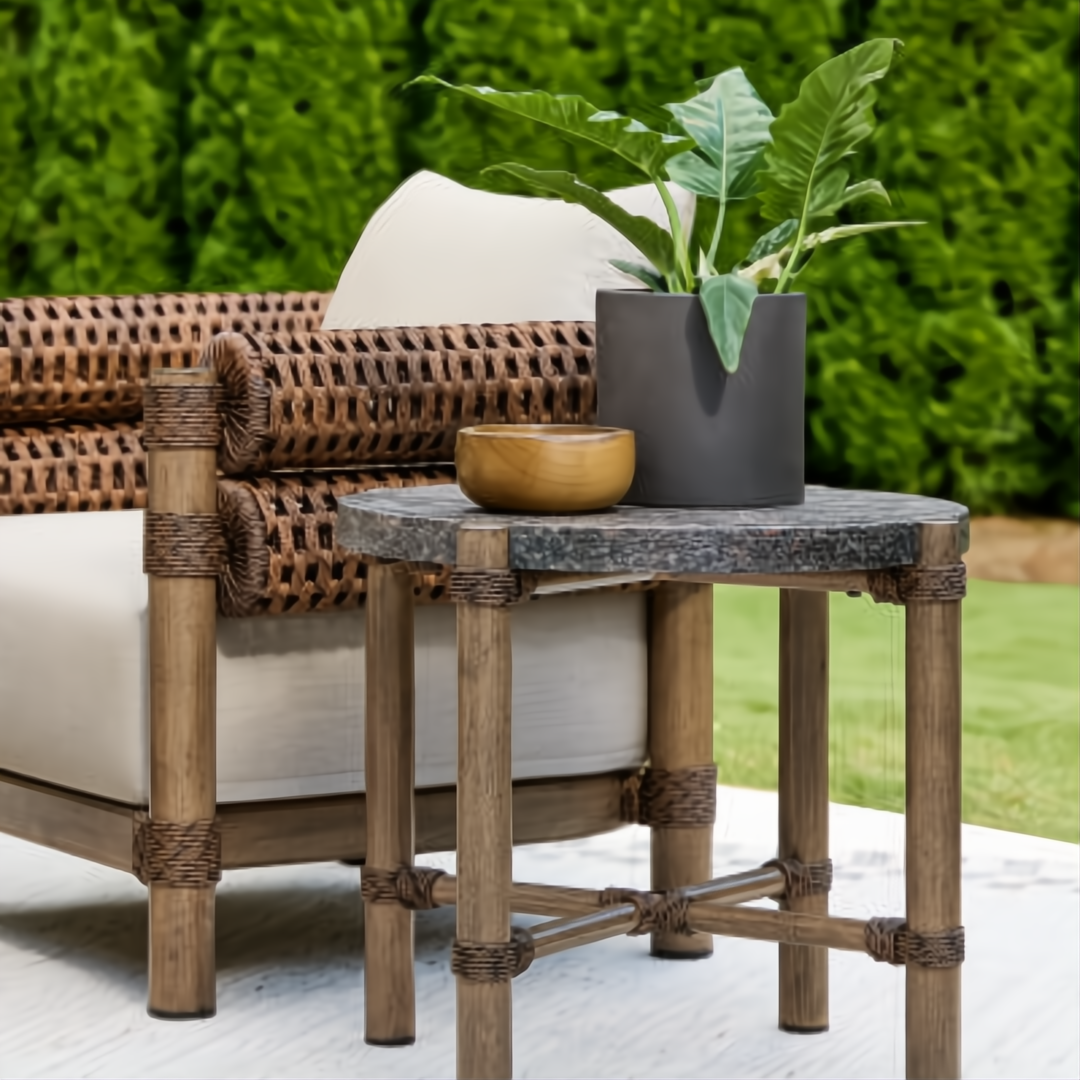 Surya Porta outdoor end table with dark brown matte stone top, brown aluminum base, and PE rope detail.