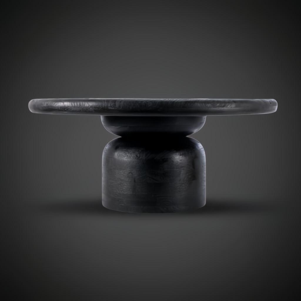 Surya Koben black sandblasted mango wood coffee table with a round top and turned base.