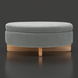 Surya Corson round storage ottoman with light gray polyester upholstery and natural wood base.