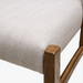 Surya Bergene dining chair with light beige polyester-linen upholstery and brown rubber wood frame.