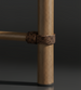 Close-up of Surya Porta End Table leg with brown hand-painted aluminum and PE rope-wrapped detail.