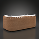 Marvella outdoor sectional with light brown woven wicker base and white cushions.