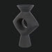 Surya Yagya YAG-008 black brushed matte ceramic vase with a sleek sculptural silhouette and central cutout.