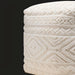 Surya Matthew knitted ivory pouf with textured geometric patterns, a modern casual accent.