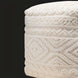 Surya Matthew knitted ivory pouf with textured geometric patterns, a modern casual accent.