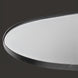 Close-up of a modern Surya Aamnah wall mirror with a black iron frame and beveled glass.