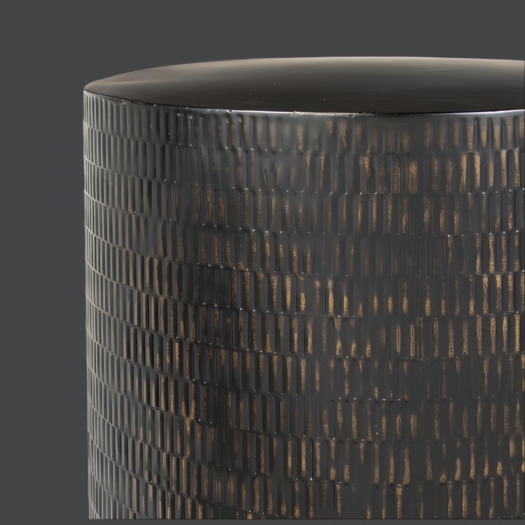 Surya Amenet black iron end table with hammered detailing and a hand-finished surface.