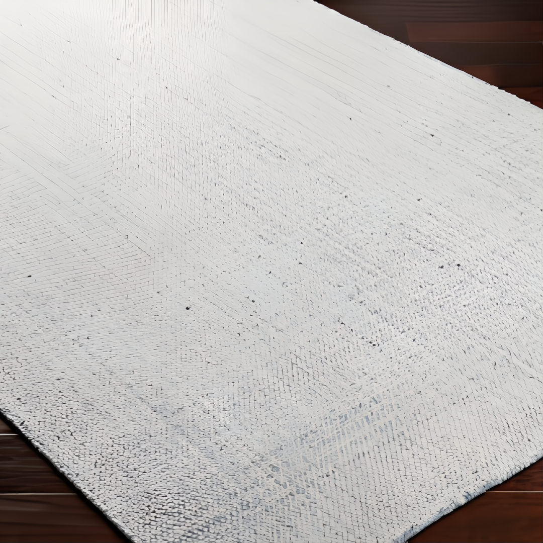 White, light blue, and light slate Surya Hope flatwoven rug made from recycled PET yarn on a dark wood floor.