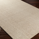 Surya Aiden AEN-1000 hand-tufted wool area rug in Tan and Ivory with a medium pile.