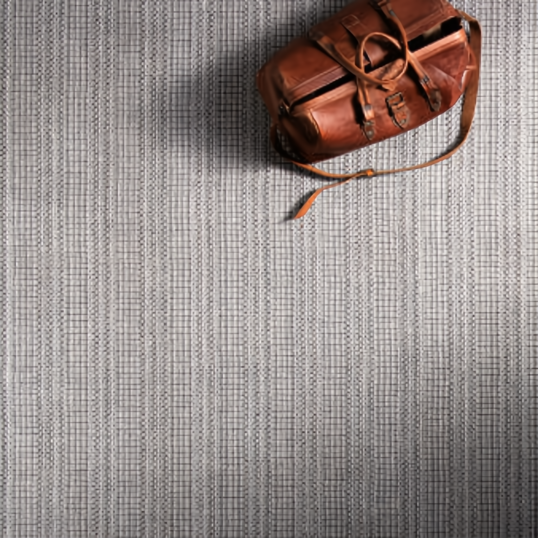 Surya Hickory HCK-2304-P area rug, hand-loomed with recycled PET yarn, featuring a subtle gray and beige grid pattern.