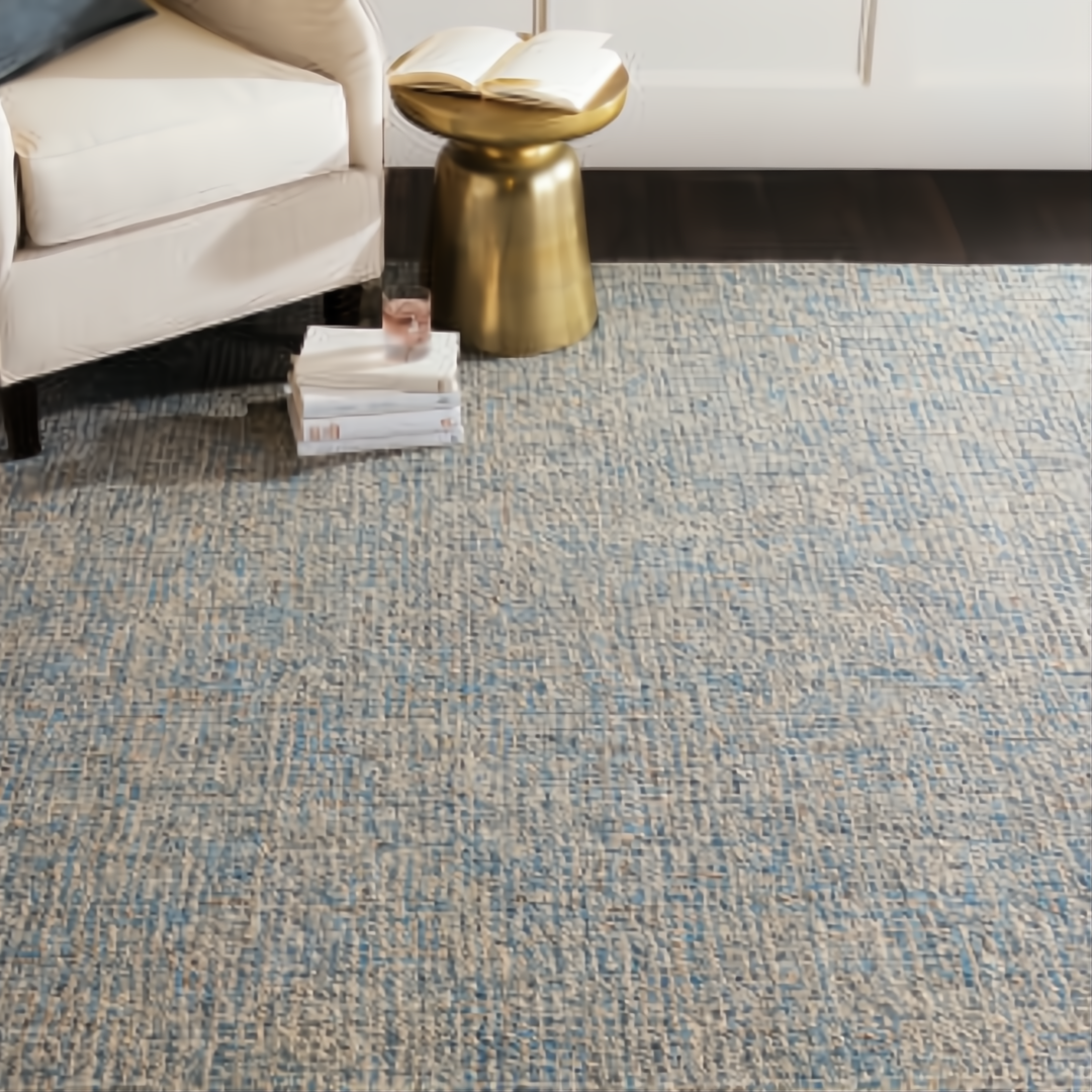 Hand-tufted Surya Aiden wool area rug in light blue and cream, with a textured medium pile.