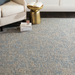 Hand-tufted Surya Aiden wool area rug in light blue and cream, with a textured medium pile.