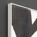 Close-up of Surya Aasmaa AAM-005 modern black and white abstract wall art with textured hand-painted canvas and white frame.