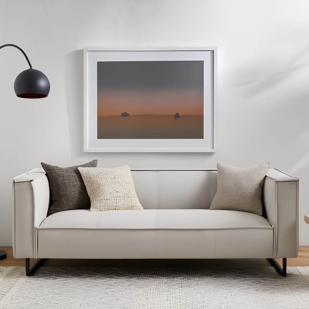 Light gray linen Surya Dylan sofa with black iron base, styled with neutral throw pillows.
