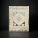Surya Anadolu AAU-2301 hand-knotted wool and viscose area rug with traditional light blue, cream, and black patterns.