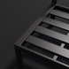 Close-up of the black powder-coated aluminum base of the Surya Antibes outdoor dining chair.