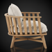 Surya Arco accent chair with light beige linen cushions and a natural wood slatted frame.