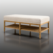 Surya Landi Bench with light beige upholstered top, rubber wood frame, and woven brown storage shelf.