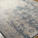 Hand-knotted wool area rug, Cappadocia CPP-5035, with traditional charcoal and wheat design, low pile, and fringe.