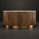 Round Surya Nems coffee table with white marble top, reeded brown mango wood base, and gold brushed brass accents.