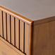 Madri dresser, a minimalist modern brown wood dresser with fluted drawer fronts.