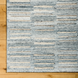 Surya Calgary CGR-2306-P hand-tufted rug with pale blue, dark blue, white, and light beige recycled PET yarn.