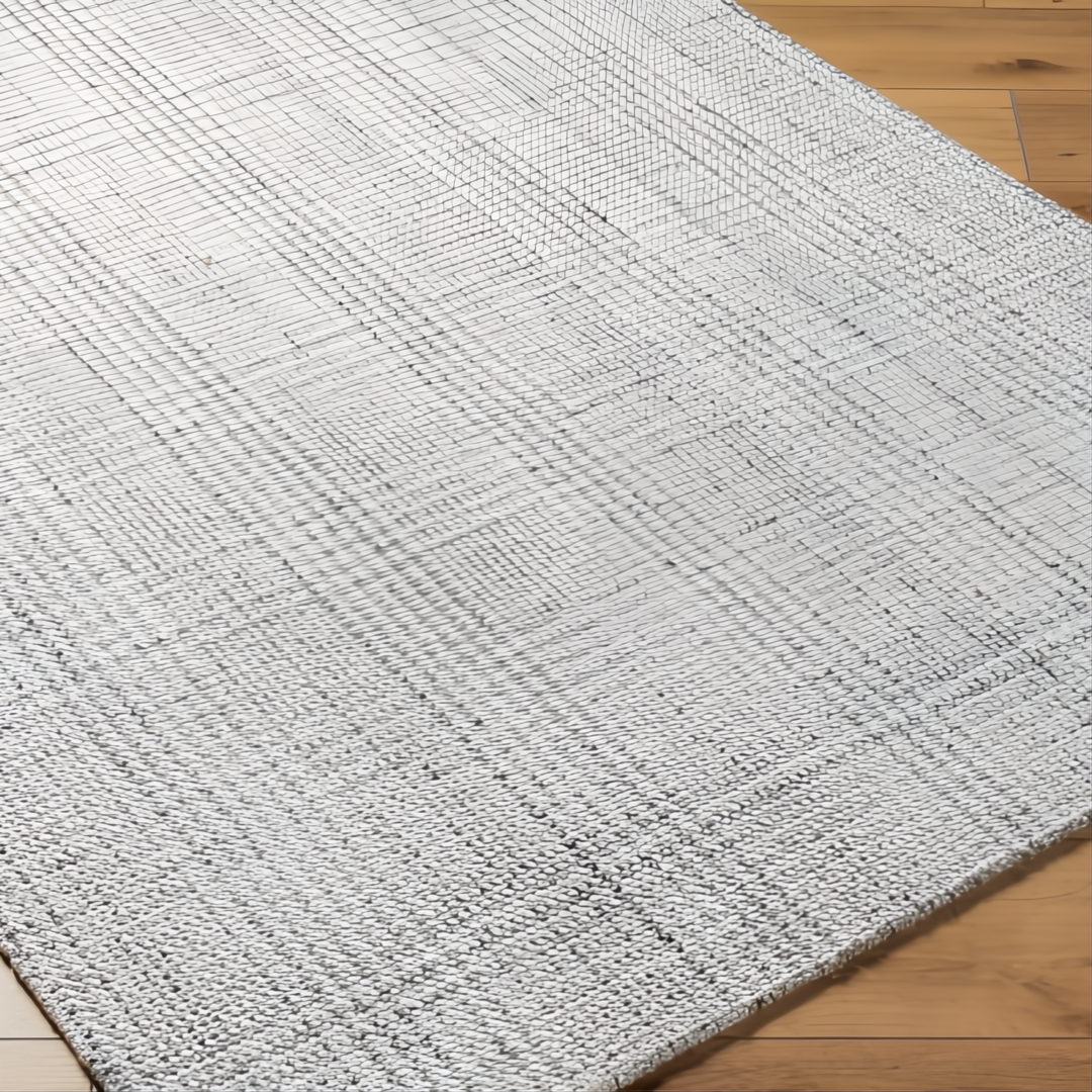 Surya Hope HOP-2303-P hand-loomed flatwoven area rug in white, gray, and light slate recycled PET yarn.