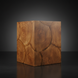 Surya Brax end table, a compact brown lacquered acacia cube with visible wood grain and knot patterns.