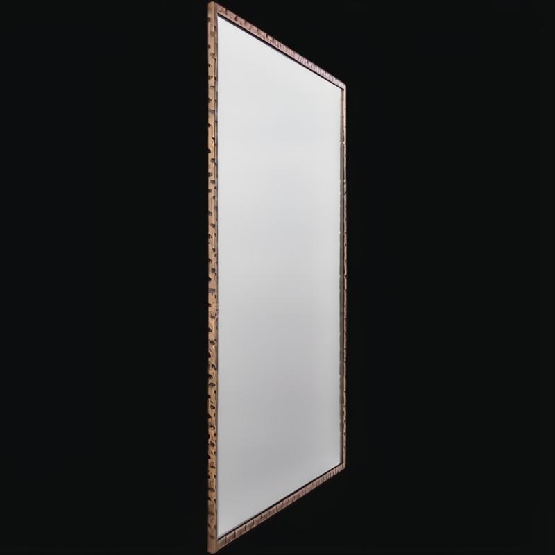 Surya Alchemist rectangular wall mirror with a hammered gold iron frame and beveled glass.