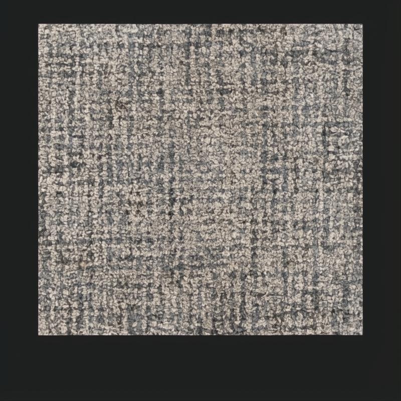 Surya Aiden wool area rug in Ink Blue and Charcoal, featuring a medium pile and hand-tufted texture.