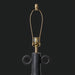 Traditional black ceramic accent table lamp base with gold harp and finial.
