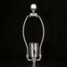 Silver metal lamp harp and socket with "SURYA" embossed, on a black background.