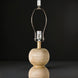 Surya Algarve accent floor lamp base with a light beige, textured resin body and metal harp.