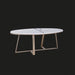Surya Akola oval coffee table with a white natural marble top and a gold powder-coated iron base.