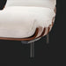 Modern Surya Laval accent chair with oatmeal linen-blend upholstery, curved wood frame, and black iron base.