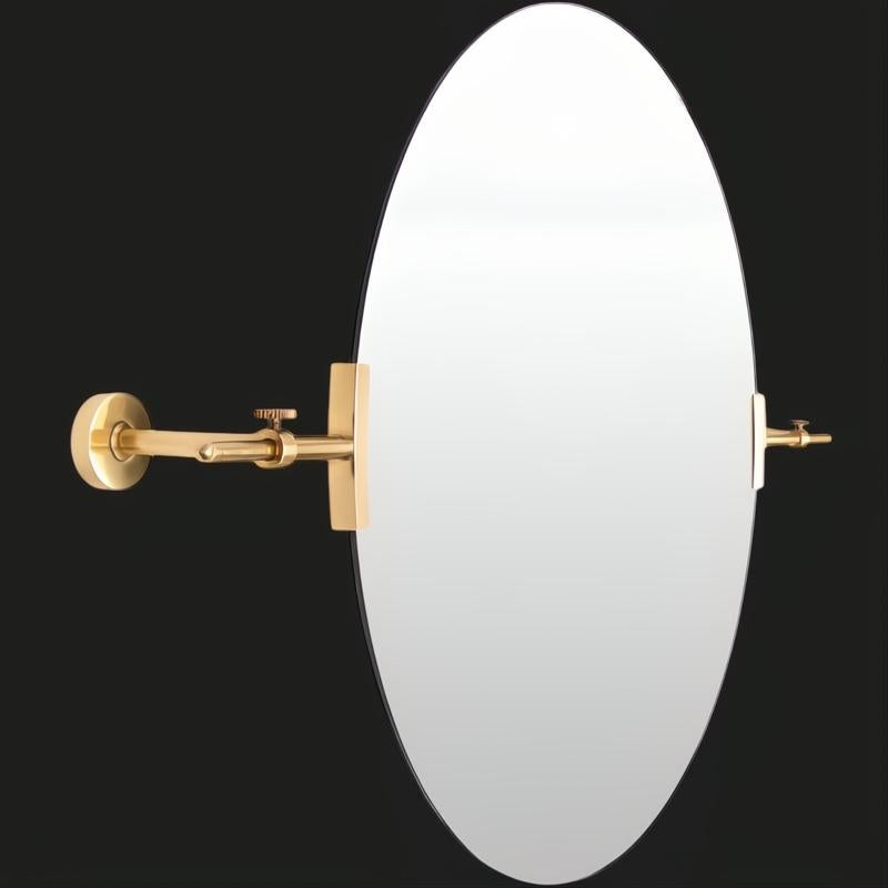 Oval wall mirror with a sleek, adjustable brass arm and mounting hardware, ideal for modern spaces.