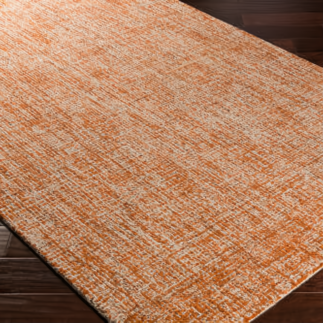 Surya Aiden AEN-1003 hand-tufted wool area rug in burnt orange and ivory, medium pile.