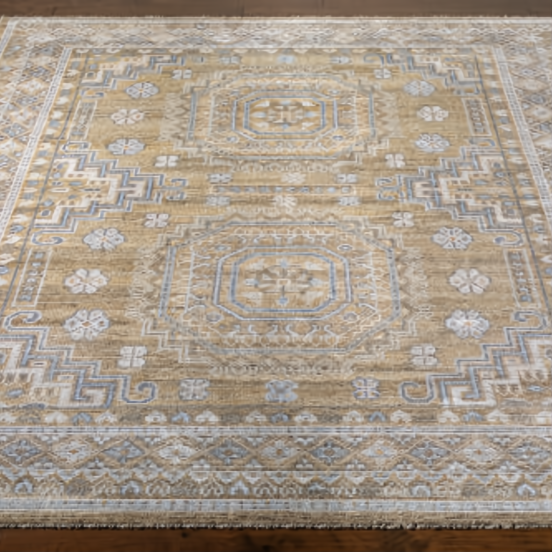 Hand-knotted Surya Almeria rug with mustard, gray, and blue geometric patterns on a low pile.