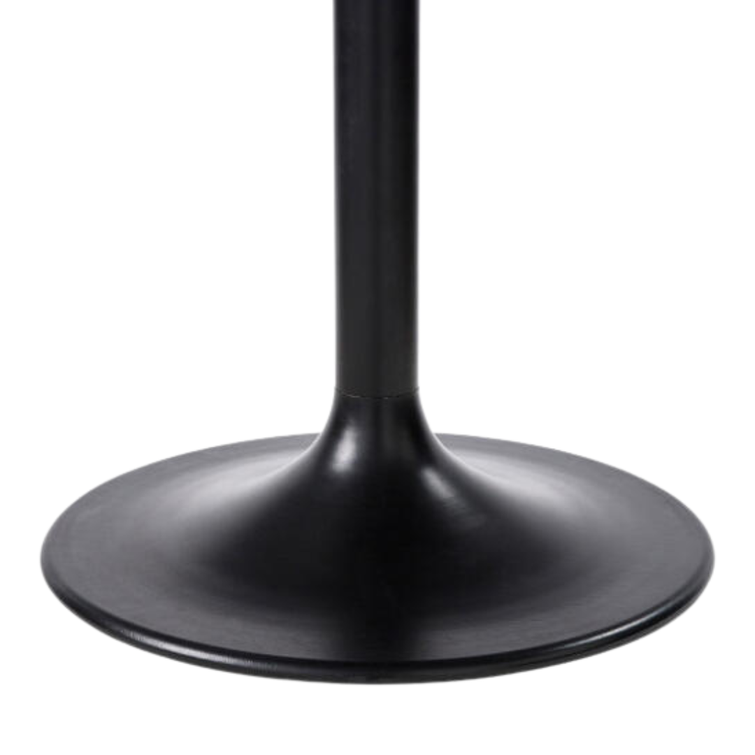 Close-up of the Surya Anatalia dining table's black powder-coated iron base, featuring a round, flared design.