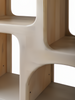 Surya Tana Bookcase, ivory washed mango wood with global-inspired bohemian design and tall, decorative profile.